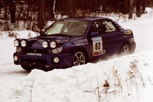 The Mark Utecht / Rob Bohn Subaru WRX sets up for a hard-right near the end of day two of the rally.