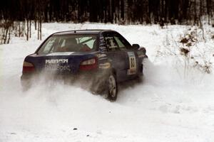 The Mark Utecht / Rob Bohn Subaru WRX clips a hard-right near the end of day two of the rally.
