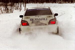 The Jonathan Bottoms / Carolyn Bosley Subaru WRX drifts nicely at a hard-right near the end of day two of the rally.
