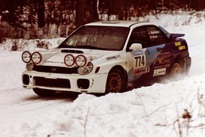 The Otis Dimiters / Peter Monin Subaru WRX STi sets up for a hard-right near the end of day two of the rally.