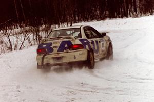 The Henry Krolikowski / Cindy Krolikowski Subaru WRX exits a hard-right near the end of day two of the rally.