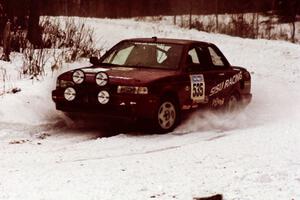 The Jake Himes / Matt Himes Nissan Sentra SE-R exits a hard-right near the end of day two of the rally.