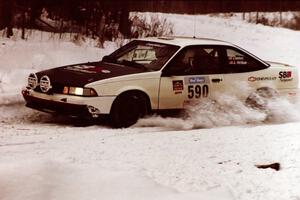 The Joel Sanford / Jeff Hribar Chevy Cavalier exits a hard-right near the end of day two of the rally.