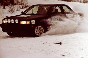 Brian Dondlinger / Dave Parps power out of a hard-right in their Nissan Sentra SE-R near the end of day two of the rally.