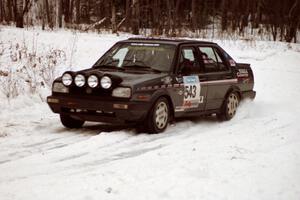 The Mike Merbach / Jeff Feldt VW Jetta exits a hard-right near the end of day two of the rally.