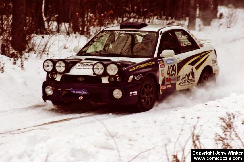 The Tanner Foust / Scott Crouch Subaru WRX sets up for a hard-right near the end of day two of the rally.