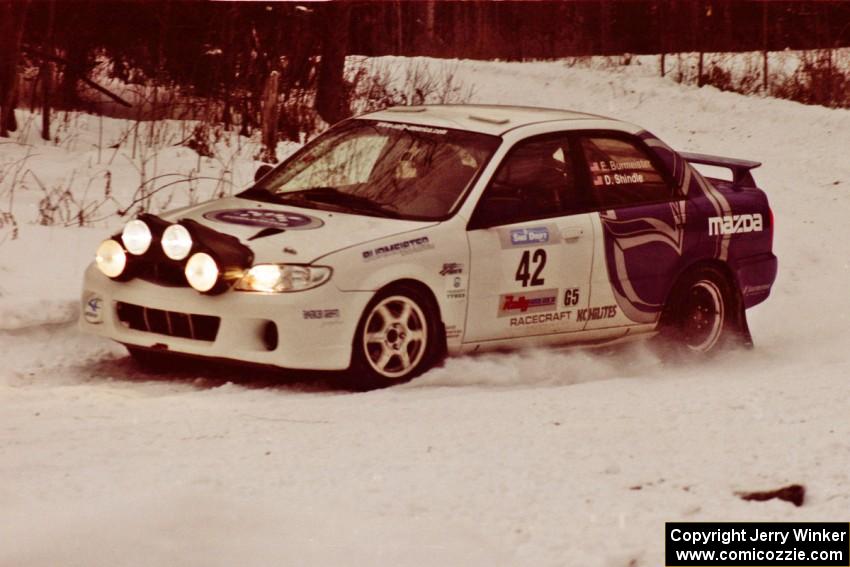 The Eric Burmeister / Dave Shindle Mazda Protege MP3 exits a hard-right near the end of day two of the rally.