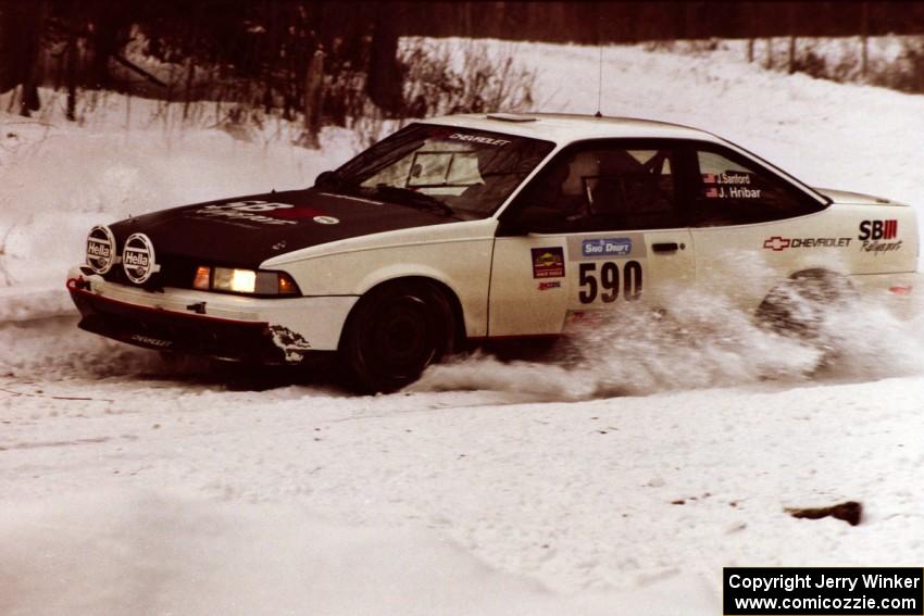 The Joel Sanford / Jeff Hribar Chevy Cavalier exits a hard-right near the end of day two of the rally.