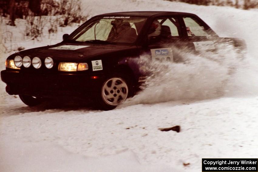 Brian Dondlinger / Dave Parps power out of a hard-right in their Nissan Sentra SE-R near the end of day two of the rally.