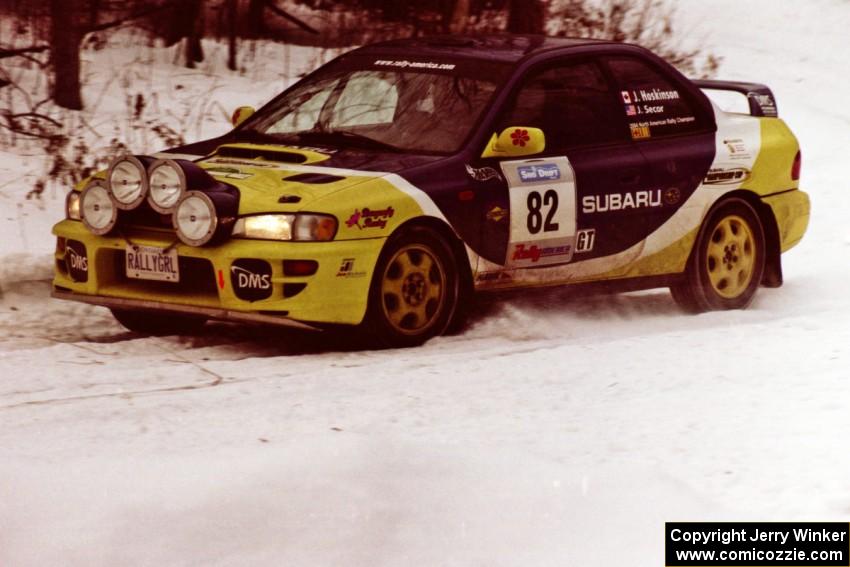 The Joan Hoskinson / Jeff Secor Subaru Impreza 2.5RS sets up for a hard-right on a stage near the end of the rally.