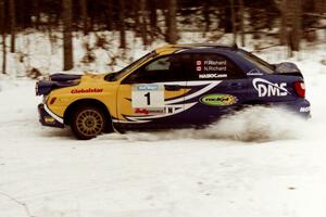 The Pat Richard / Nathalie Richard Subaru WRX STi powers through a hard right-hander on a stage near the end of the rally.