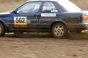 Brian Dondlinger / Dave Parps Nissan Sentra SE-R exits the Parkway Forest Rd. chicane.