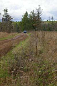 Dan Adamson / Jeremiah Schubitzke Saturn SL2 at speed on Parkway Forest Rd.