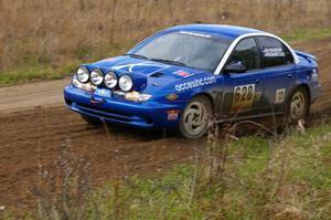 Dan Adamson / Jeremiah Schubitzke Saturn SL2 enters the chicane on Parkway Forest Rd.