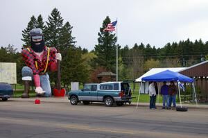 Paul Bunyan offers a hand to the Ben Hanka / Greg Hanka Mazda Protege team in Akeley.