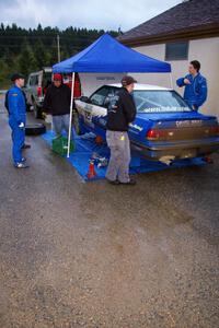 Mike Wray / John Nordlie Subaru Legacy Sport keeps out of the rain at Akeley service (3).