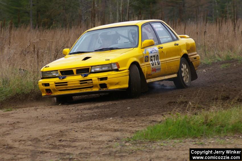 Erik Payeur / Adam Payeur Mitsubishi Galant drifts wide at the Parkway Forest Rd. chicane.