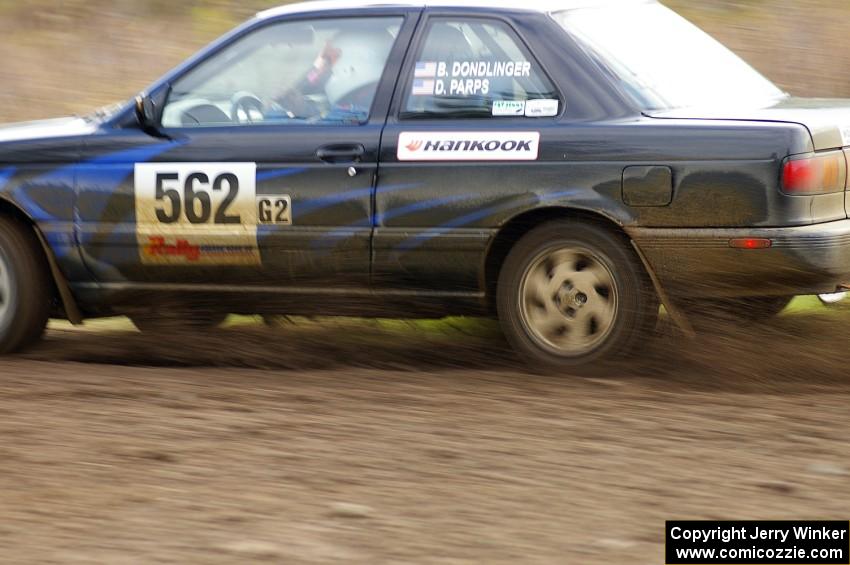 Brian Dondlinger / Dave Parps Nissan Sentra SE-R exits the Parkway Forest Rd. chicane.