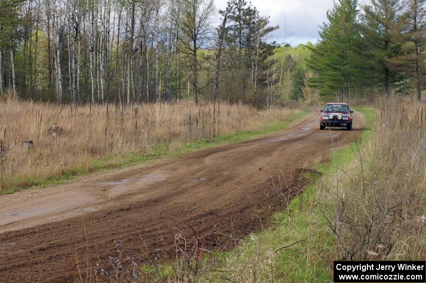 Dave Grenwis / Dan Goldman at speed down Parkway Forest Rd. in their VW GTI.