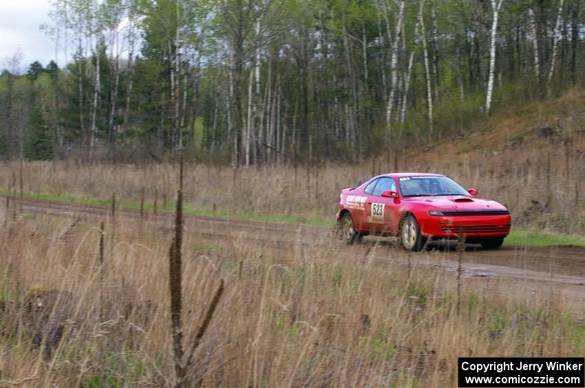 Travis Hanson / Terry Hanson Toyota Celica All-Trac at speed down Parkway Forest Rd.