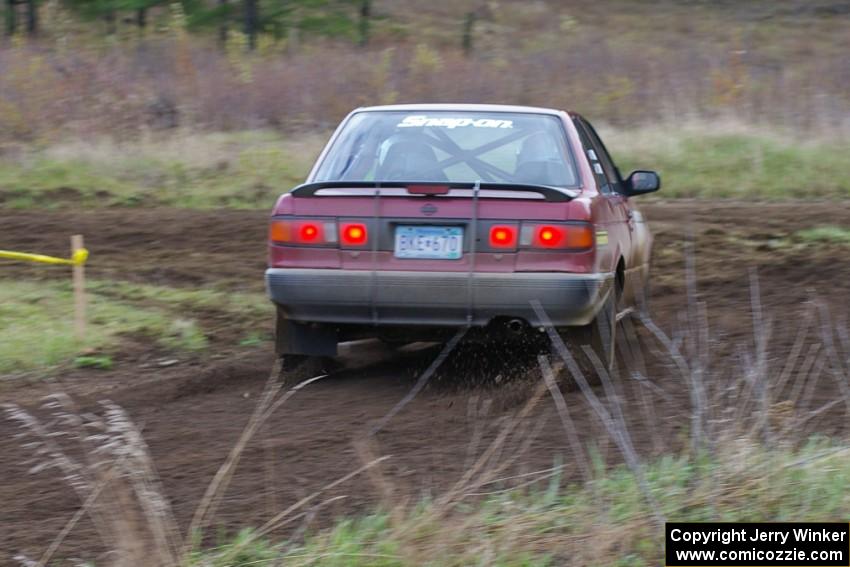 Rob Stroik / Ross Wegge in the ex-Jake Himes Nissan Sentra SE-R at the Parkway Forest Rd. chicane (1).