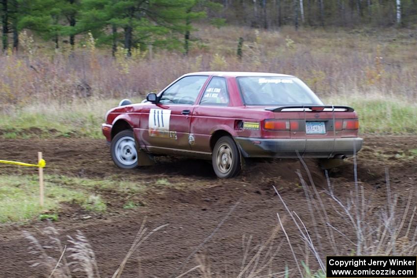 Rob Stroik / Ross Wegge in the ex-Jake Himes Nissan Sentra SE-R at the Parkway Forest Rd. chicane (2).