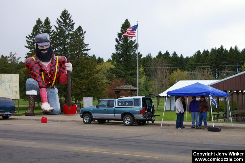 Paul Bunyan offers a hand to the Ben Hanka / Greg Hanka Mazda Protege team in Akeley.