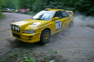 Lauchlin O'Sullivan / Scott Putnam Subaru Impreza were in top form at a hairpin on SS1.