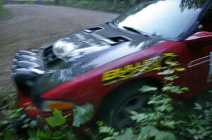Cary Kendall / Scott Friberg get a little too close at the apex of a hairpin on SS1 in their Eagle Talon.
