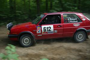 Karl Biewald / Ted Weidman VW GTI exits a hairpin on SS1.