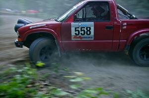 Jim Cox / Ryan LaMothe Chevy S-10 at a hairpin on SS1.