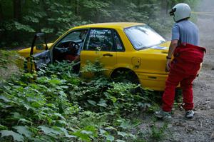 Erik Payeur / Adam Payeur Mitsubishi Galant got stuck atop a boulder at the apex of a corner on SS1 (1).