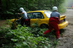 Erik Payeur / Adam Payeur Mitsubishi Galant got stuck atop a boulder at the apex of a corner on SS1 (2).