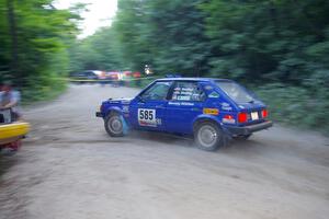 Dave Sterling / Mark Utecht Dodge Omni GLH at the first hairpin left on SS1.