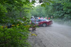 Erick Nelson / Greg Messler Ford Probe GT at the first sharp hairpin left on SS1.