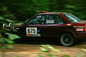 Ben Hanka / Greg Hanka Mazda Protege at speed on SS1.