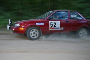 Rob Stroik / Ross Wegge Nissan Sentra SE-R prepares for a hairpin left on SS1.