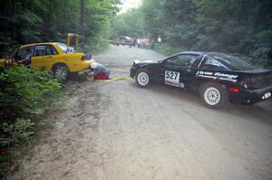 Craig Walli / Jonah Liubakka Eagle Talon frees the Erik Payeur / Adam Payeur Mitsubishi Galant off the boulder on SS1.