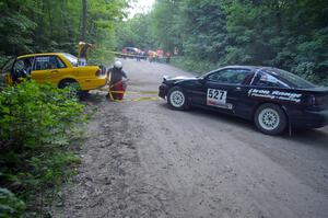 Craig Walli / Jonah Liubakka Eagle Talon frees the Erik Payeur / Adam Payeur Mitsubishi Galant off the boulder on SS1.