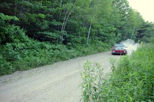 Cary Kendall / Scott Friberg exit out of a a left-hand sweeper onto a straight on SS2 in their Eagle Talon.