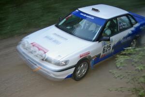 Mike Wray / John Nordlie Subaru Legacy Sport at speed on a straight on SS2.