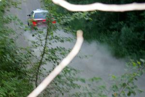 Scott Parrott / Breon Nagy Plymouth Neon at speed on a straight on SS2 just before sundown.