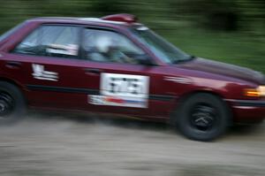 Ben Hanka / Greg Hanka Mazda Protege at speed on SS2.