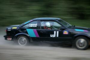 Jason Beck / Harry Beck Pontiac Sunbird at speed on SS2 before the car was totaled against a tree.