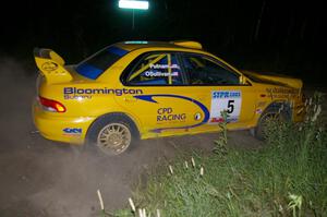 Lauchlin O'Sullivan / Scott Putnam Subaru Impreza drifts through a 90-right on SS4.