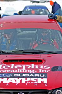 Brent Carlson rides shotgun with Matt Shaffer in the #84 Subaru Impreza