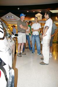 Matt Iorio discusses his Subaru Impreza to new rally fans at the Mall of America.