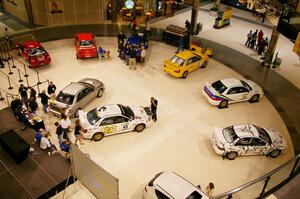 A view from the upper floor of the Mall of America of rally cars on display (3).