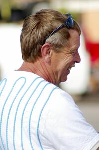 Bruce Davis cracks a big grin at parc expose on day one. Jimmy Brandt was his co-driver in his Dodge SRT-4.