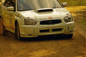 Stig Blomqvist / Ana Goni at speed through a fast left-hander on Halverson Lake, SS1, in their Subaru WRX STi.